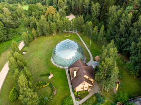 MERKINE, LITHUANIA - AUGUST 16, 2018: Merkine Pyramid, protected by a glass dome, famous for healing...