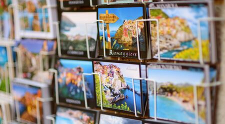 CORNIGLIA, ITALY - NOVEMBER 20, 2018: Various postcards from Cinque Terre displayed at souvenir shopのeditorial素材