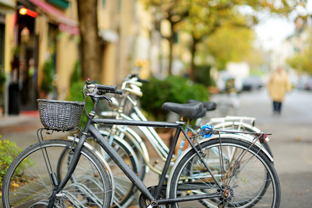 Bicycles parked on beautiful medieval streets of Lucca city, known for its intact Renaissance-era city walls, Tuscany, Italy.の写真素材