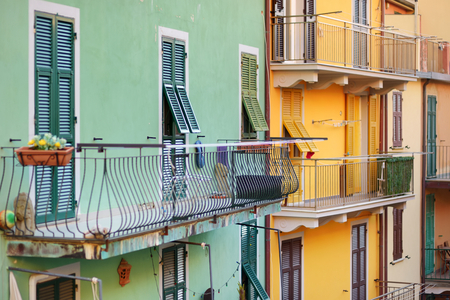 Colorful houses of Manarola, one of the five centuries-old villages of Cinque Terre, located on rugged northwest coast of Italian Riviera, Liguria, Italy.の写真素材
