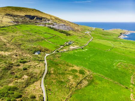 Spectacular aerial view of Mullaghmore Head with huge waves rolling ashore. Picturesque scenery with magnificent Classiebawn Castle. Signature point of the Wild Atlantic Way, County Sligo, Irelandの写真素材