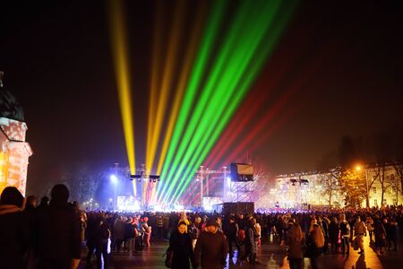 VILNIUS, LITHUANIA - FEBRUARY 16, 2018: Hundreds of people attending the celebration of Restoration of the State Day in Vilnius. Bonfires are lit on Gediminas avenue on festive night on February 16.のeditorial素材