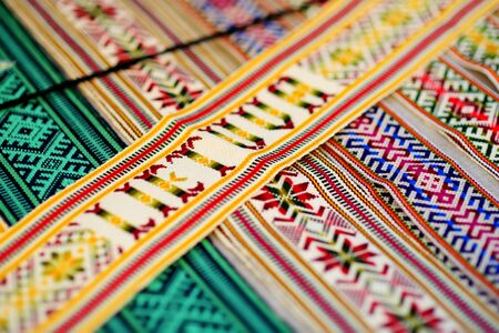 Details of a traditional colorful Lithuanian weave. Woven belts as a part of national Lithuanian...