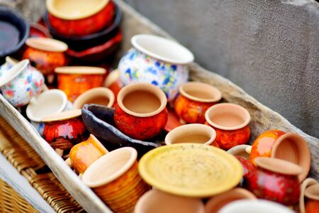 Ceramic dishes, tableware and jugs sold on Easter market in Vilnius. Lithuanian capital's annual traditional crafts fair is held every March on Old Town streets.の写真素材