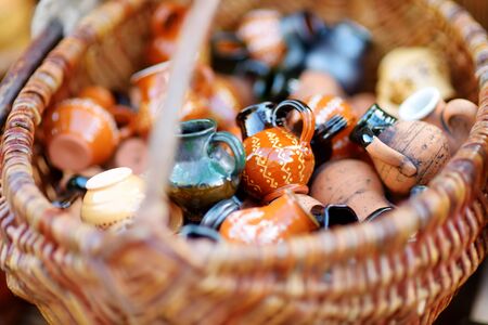 Ceramic dishes, tableware and jugs sold on Easter market in Vilnius. Lithuanian capital's annual traditional crafts fair is held every March on Old Town streets.の写真素材