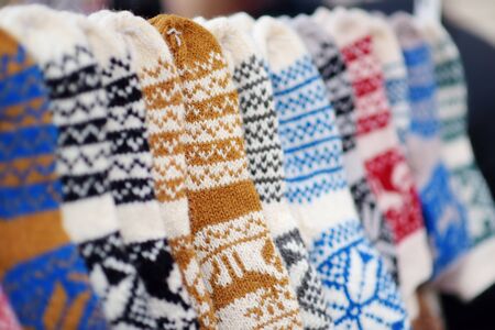 Colorful warm knitted socks sold on Easter market in Vilnius. Annual spring fair hold in March on...