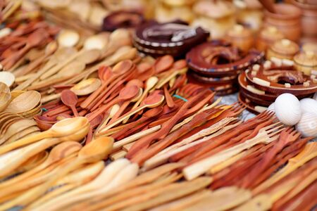 Wooden kitchenware and decorations sold on Easter market in Vilnius. Lithuanian capital's annual traditional crafts fair is held every March on Old Town streets.の写真素材