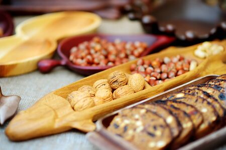 Assorted nuts and organic bread sold on traditional Lithuanian Easter fair in Vilnius, Lithuania