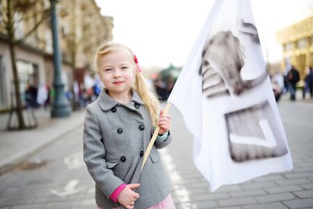 VILNIUS, LITHUANIA - APRIL 1, 2017: People participating in Physicists Day (FiDi), a humorous event with traditional Dinosaur Parade organized annually by The Faculty of Physics of Vilnius Universityのeditorial素材