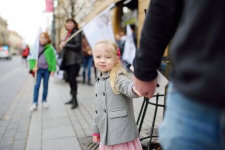 VILNIUS, LITHUANIA - APRIL 1, 2017: People participating in Physicists Day (FiDi), a humorous event with traditional Dinosaur Parade organized annually by The Faculty of Physics of Vilnius Universityのeditorial素材