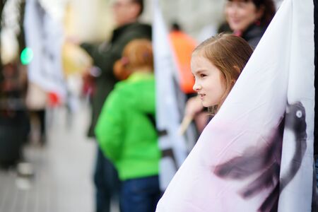 VILNIUS, LITHUANIA - APRIL 1, 2017: People participating in Physicists Day (FiDi), a humorous event with traditional Dinosaur Parade organized annually by The Faculty of Physics of Vilnius Universityのeditorial素材