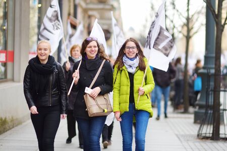 VILNIUS, LITHUANIA - APRIL 1, 2017: People participating in Physicists Day (FiDi), a humorous event with traditional Dinosaur Parade organized annually by The Faculty of Physics of Vilnius Universityのeditorial素材