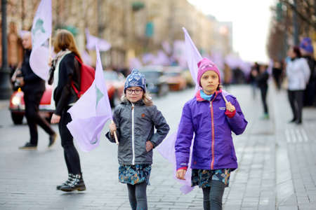VILNIUS, LITHUANIA - APRIL 6, 2019: People participating in Physicists Day (FiDi), a humorous event with traditional Dinosaur Parade organized annually by The Faculty of Physics of Vilnius Universityのeditorial素材
