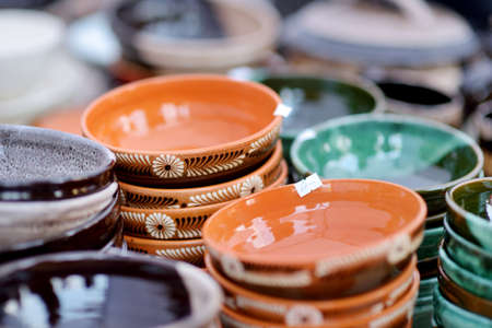 Ceramic dishes, tableware and jugs sold on Easter market in Vilnius. Lithuanian capital's annual traditional crafts fair is held every March on Old Town streets.の写真素材