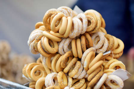 Loaves of organic bagels for sale at outdoor farmers market in Vilnius. Traditional spring fair in...