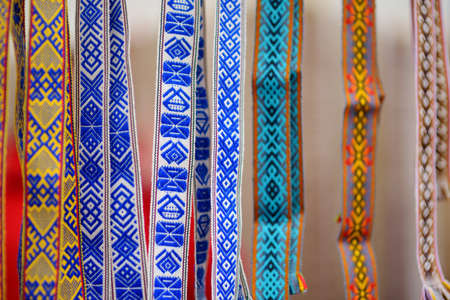 Details of a traditional colorful Lithuanian weave. Woven belts as a part of national Lithuanian...