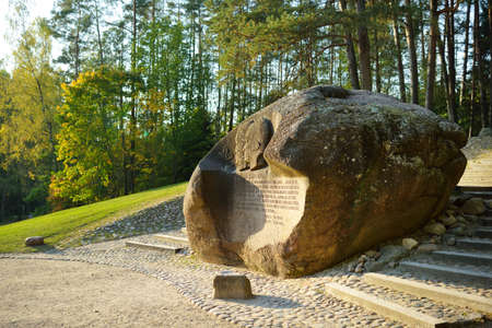 ANYKSCIAI, LITHUANIA - SEPTEMBER 10, 2020: Puntukas, second-largest boulder in Lithuania, featuring engraved portraits and quotes of Lithuanian pilots Steponas Darius and Stasys Girenas.のeditorial素材