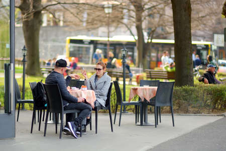 BERGAMO, ITALY - APRIL 2019: Everyday life of tourists and townspeople on beautiful medieval streets of Bergamo city, Lombardy, Italy.のeditorial素材