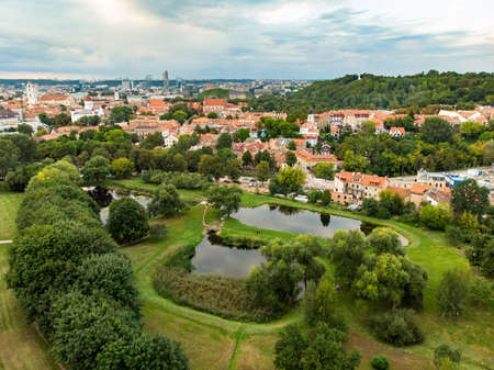 Beautiful Vilnius city panorama in autumn with orange and yellow foliage. Aerial evening view. Fall city scenery in Vilnius, Lithuaniaの写真素材