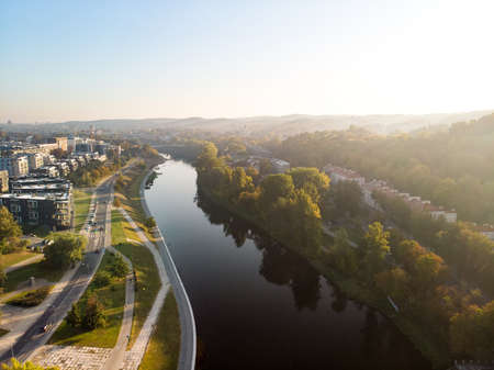 Beautiful Vilnius city panorama in autumn with orange and yellow foliage. Aerial evening view. Fall city scenery in Vilnius, Lithuaniaの写真素材