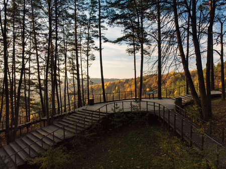 Beautiful Vilnius city panorama in autumn with orange and yellow foliage. Aerial evening view. Fall city scenery in Vilnius, Lithuaniaの写真素材