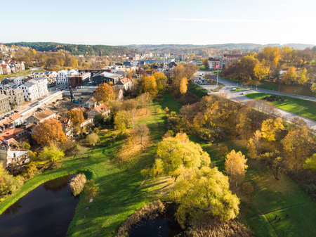 Beautiful Vilnius city panorama in autumn with orange and yellow foliage. Aerial evening view. Fall city scenery in Vilnius, Lithuaniaの写真素材