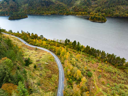 Aerial view of the Lake District, famous for its glacial ribbon lakes and rugged mountains. Popular...