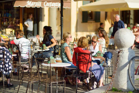 LUCCA, ITALY - JUNE4, 2019: Beautiful medieval streets of Lucca city, known for its intact Renaissance-era city walls and well preserved historic center. Province of Lucca, Tuscany, Italy.のeditorial素材