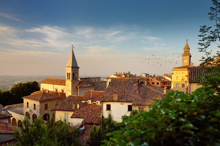 Beautiful sunset view of San Marino microstate and Emilia-Romagna region of Italy from the rooftops of the city of San Marino.の写真素材