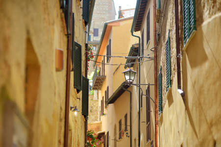Narrow old streets of Montepulciano town, located on top of a limestone ridge surrounded by vineyards. Vino Nobile wine territory, known worldwide for its wine and food tours. Tuscany, Italy.の写真素材