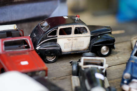 AMSTERDAM - AUGUST 2011: Old tin toy cars sold on a flea market in Amsterdam, Netherlands, Holland.のeditorial素材