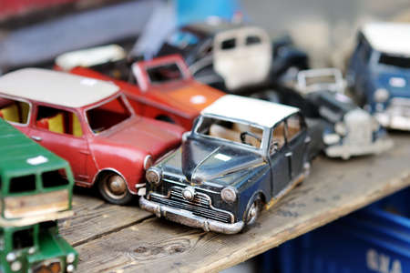 AMSTERDAM - AUGUST 2011: Old tin toy cars sold on a flea market in Amsterdam, Netherlands, Holland.のeditorial素材