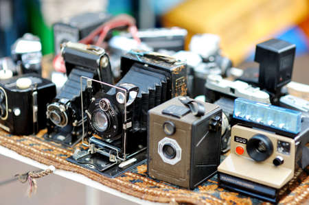 AMSTERDAM - AUGUST 2011: Old photo cameras sold on a flea market in Amsterdam, Netherlands, Holland.