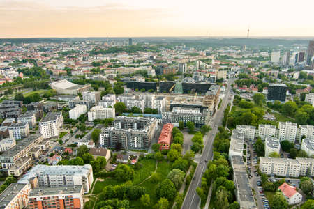 Aerial view of residential area in Vilnius, Lithuania. New modern apartment complex. Low rise european apartment building complex with outdoor facilities.の写真素材