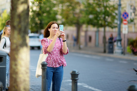 VILNIUS, LITHUANIA - SEPTEMBER 11, 2021: People participating in Physicists Day FiDi, a humorous event with Dinosaur Parade organized annually by The Faculty of Physics of Vilnius Universityのeditorial素材
