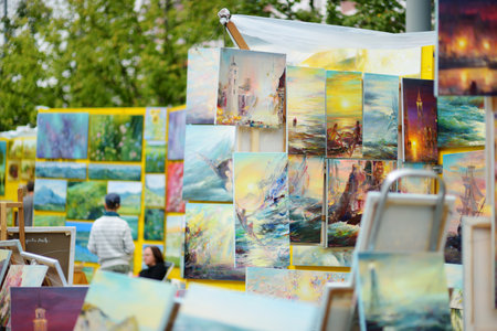 VILNIUS, LITHUANIA - SEPTEMBER 19, 2021: Paintings sold on annual Nations Fair, where masters from the national communities of Lithuania present their arts, crafts and traditions.のeditorial素材