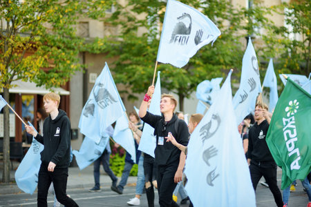 VILNIUS, LITHUANIA - SEPTEMBER 11, 2021: People participating in Physicists Day FiDi, a humorous event with Dinosaur Parade organized annually by The Faculty of Physics of Vilnius Universityのeditorial素材
