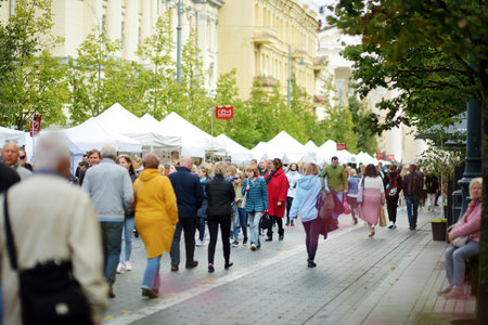 VILNIUS, LITHUANIA - SEPTEMBER 19, 2021: People attending annual Nations Fair, where masters from the national communities of Lithuania present their arts, crafts, national customs and traditions.のeditorial素材
