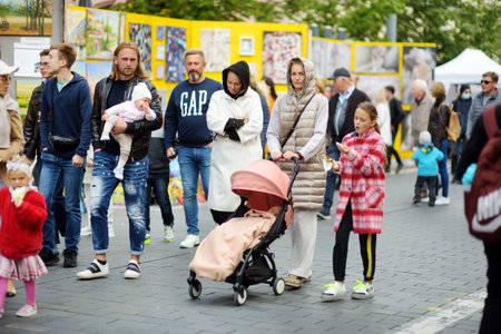 VILNIUS, LITHUANIA - SEPTEMBER 19, 2021: People attending annual Nations Fair, where masters from the national communities of Lithuania present their arts, crafts, national customs and traditions.のeditorial素材