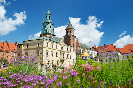KRAKOW, POLAND - AUGUST 2021: The Wawel Royal Castle, a castle residency located in central Krakow. Tourists exploring the Wawel Hill, the most historically and culturally important site in Poland.のeditorial素材