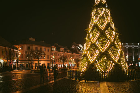 VILNIUS, LITHUANIA - DECEMBER 2021: Town hall square in Vilnius Old Town decorated for Christmas. Celebrating Christmas and New Year in Lithuanian capital.のeditorial素材