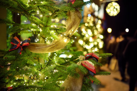 Narrow streets of Vilnius Old Town decorated for Christmas. Christmas lights, trees and ornaments...