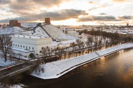 Beautiful Vilnius city panorama in winter with snow covered houses, churches and streets. Aerial evening view. Winter city scenery in Vilnius, Lithuania.の写真素材