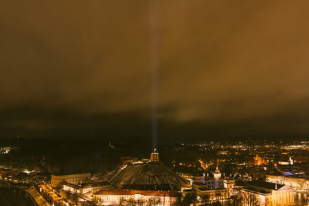 Scenic aerial view of Gediminas tower in Vilnius Old Town beautifully illuminated for 699th birthday...