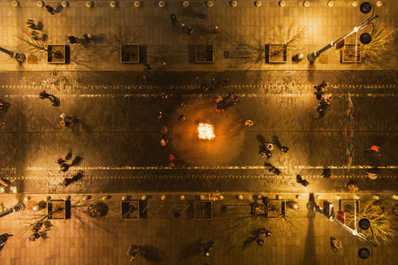 Aerial night view of the celebration of Restoration of the State Day in Vilnius. Bonfires are lit on Gediminas avenue on festive night on February 16.のeditorial素材