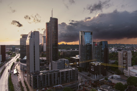 VILNIUS, LITHUANIA - MAY 2022: Beautiful aerial evening view of Vilnius business district with scenic sunset illumination. City life in Vilnius, Lithuania.のeditorial素材