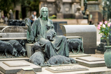 Impressive sculptures on the tombs and monuments of Cimitero Monumentale di Milano or Monumental Cemetery of Milan, the burial place of the most remarkable Italians. Milan, Italy.の写真素材