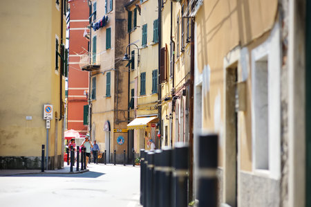 SAN TERENZO, ITALY - MAY 2011: Narrow medieval streets of picturesque San Terenzo village. Gulf of La Spezia, Liguria, Italy, Europeのeditorial素材
