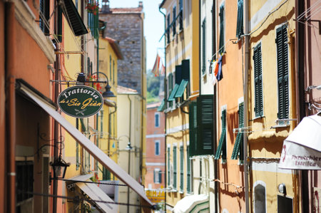 SAN TERENZO, ITALY - MAY 2011: Narrow medieval streets of picturesque San Terenzo village. Gulf of La Spezia, Liguria, Italy, Europeのeditorial素材
