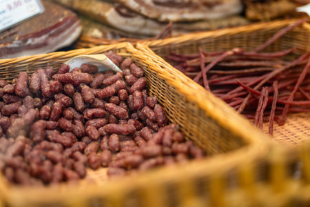 Selection of assorted home made meats, jerky and sausages on a farmers market in Vilnius, Lithuania. Kaziukas, traditional spring fair in capital of Lithuania.の写真素材